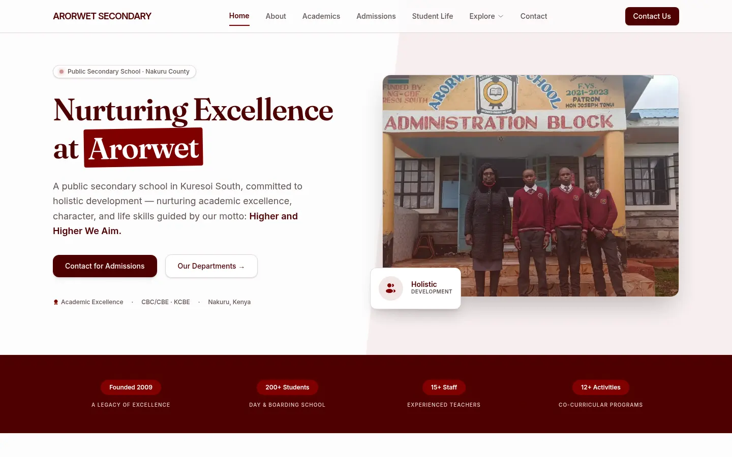 The Arorwet Secondary School home page, with an admissions button beside a photo of the school administration block.